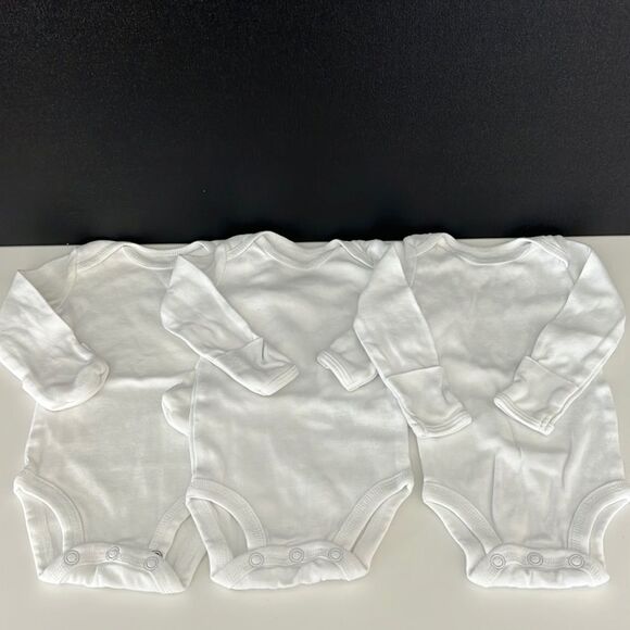 2 Carter’s onesies  - Picture 1 of 4